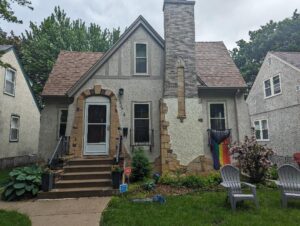 Home stucco repair project before image