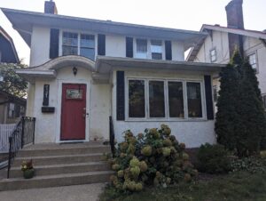 Home stucco repair project before image