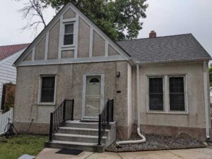 home stucco repair before image